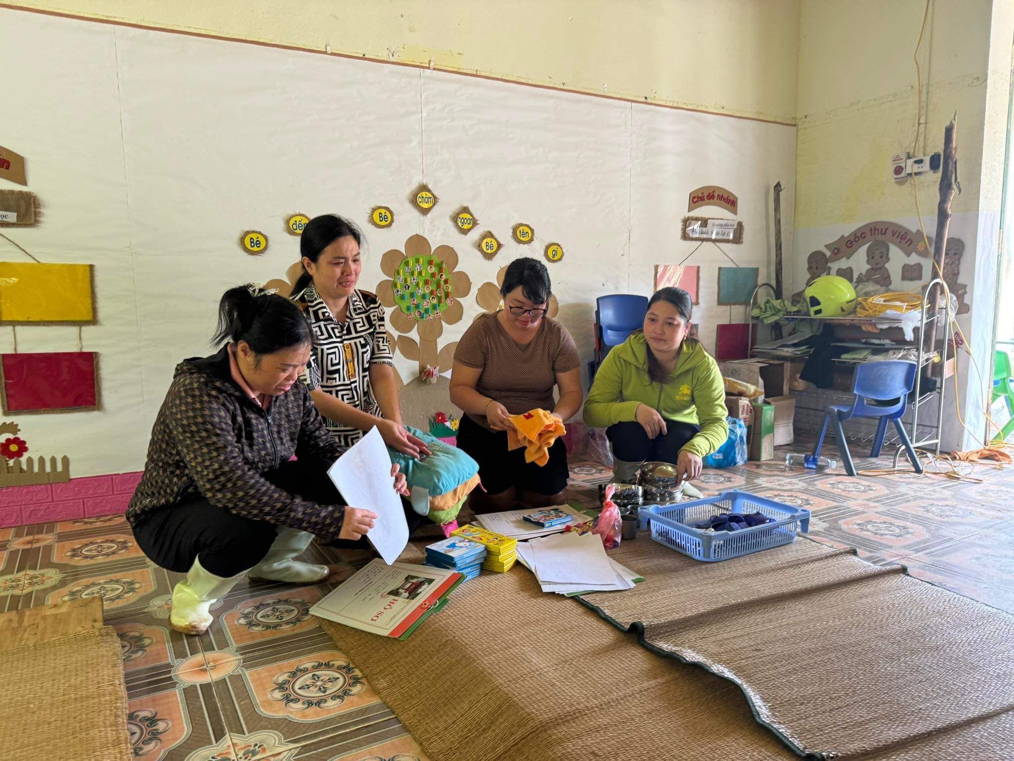 May be an image of 4 people, people studying and text